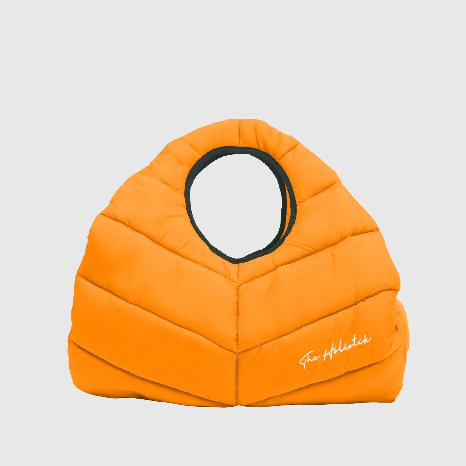 Amara Orange Puffer Bag: Vibrant and stylish puffer bag in bold orange, perfect for adding a pop of color to your outfit. Designed with a smart interior featuring a main compartment, zipper pocket, and two slide pockets for easy organization. Ideal for gym, yoga, or weekend trips, with a touch of elegance from THE HOLISIK embroidery. A must-have accessory for fashion-forward women.
SEO KEYWORDS
Amara Puffer Bag Orange
Orange puffer bag for women
Vibrant orange puffer bag
Stylish orange puffer bag
Amara bag