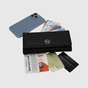 Elegant black women's purse with a sleek design, featuring a smooth leather finish and gold-tone hardware, perfect for formal events and daily use.