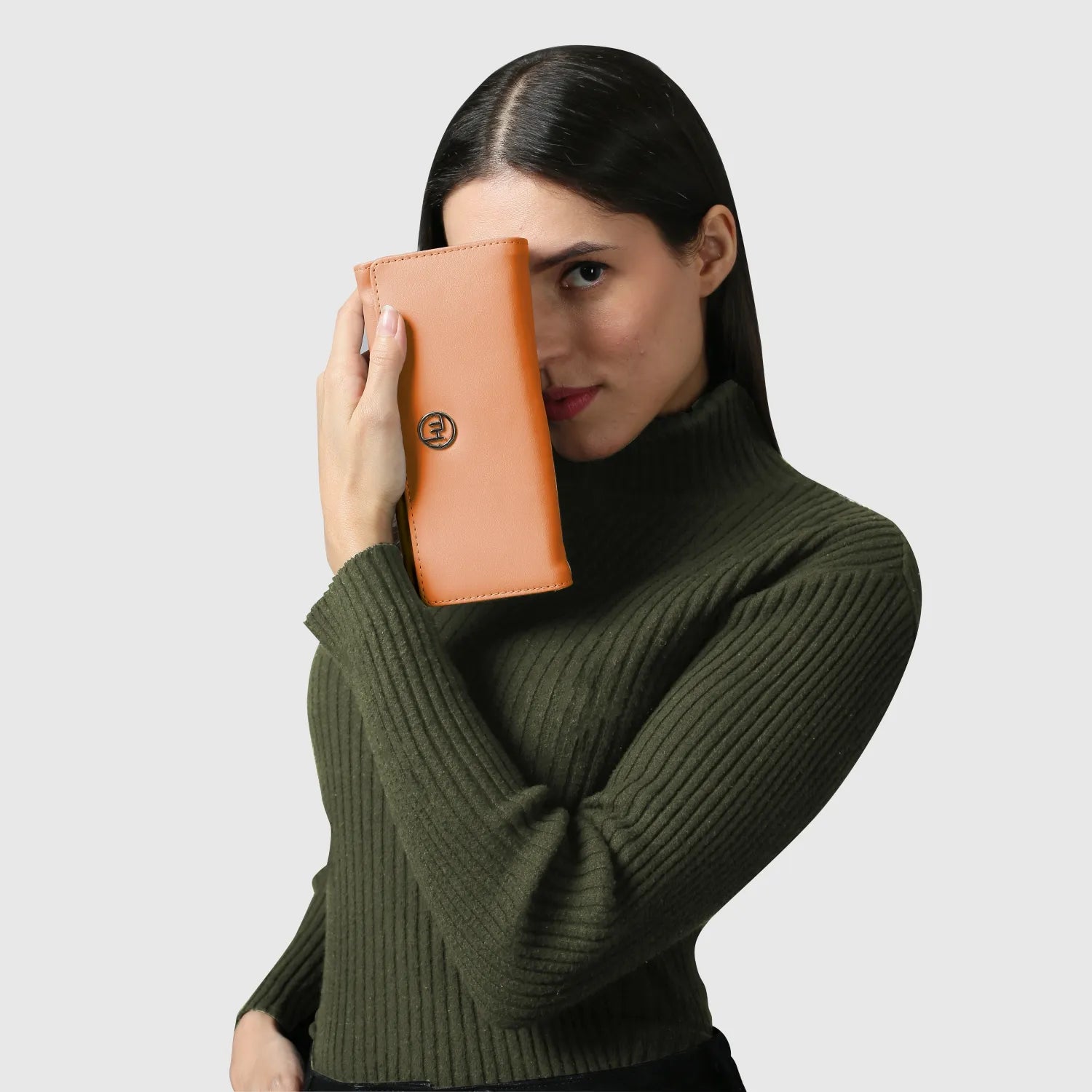 Elegant hand clutch with a sleek design, featuring a glossy finish and gold-tone accents, perfect for evening events and formal occasions